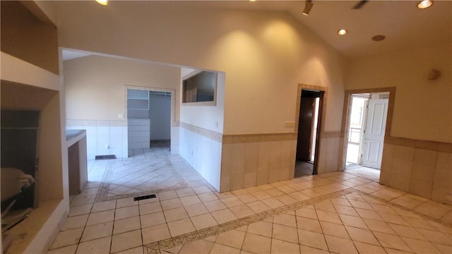 1442 Greensburg Pike, Sewickley Twp, PA 15089 - corridor featuring wainscoting, light tile patterned floors, high vaulted ceiling, and recessed lighting