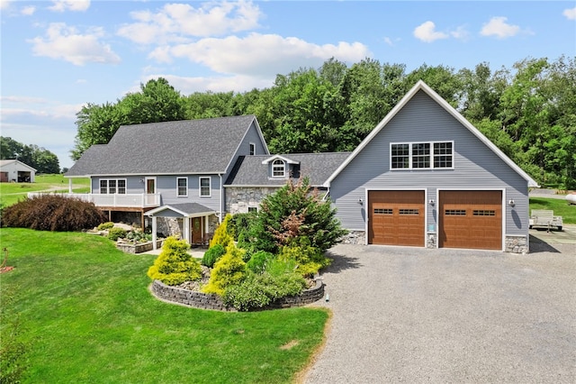 1419 Bullion Rd, Victory Twp, PA 16342 - view of front of home featuring stone siding, a garage, a front yard, a shingled roof, and driveway