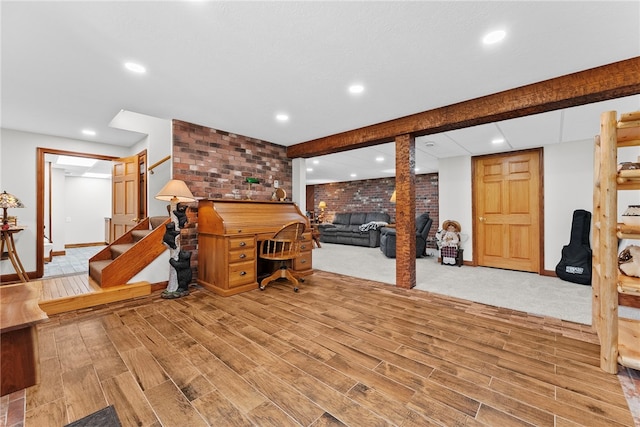 1419 Bullion Rd, Victory Twp, PA 16342 - home office featuring brick wall, recessed lighting, and wood finished floors