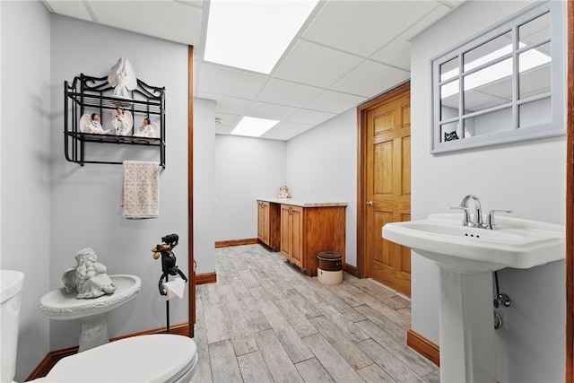 1419 Bullion Rd, Victory Twp, PA 16342 - bathroom with a drop ceiling and wood finished floors