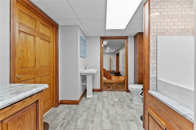 1419 Bullion Rd, Victory Twp, PA 16342 - full bathroom featuring wood finished floors and a drop ceiling