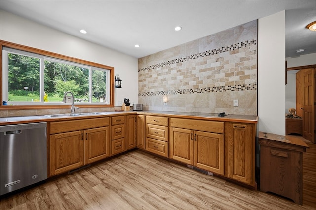 1419 Bullion Rd, Victory Twp, PA 16342 - kitchen featuring stainless steel dishwasher, light wood finished floors, light countertops, brown cabinetry, and recessed lighting