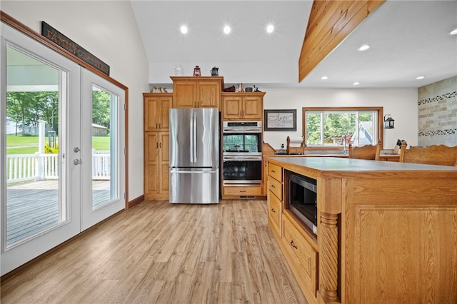 1419 Bullion Rd, Victory Twp, PA 16342 - kitchen with stainless steel appliances, light wood-style floors, lofted ceiling, recessed lighting, and light countertops