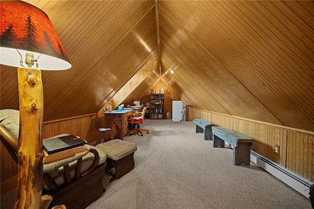 1419 Bullion Rd, Victory Twp, PA 16342 - additional living space featuring a baseboard radiator, carpet flooring, wooden walls, and lofted ceiling