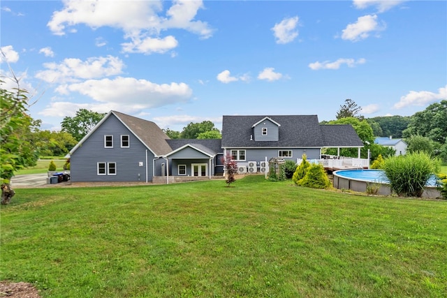 1419 Bullion Rd, Victory Twp, PA 16342 - back of property with a lawn and an outdoor pool