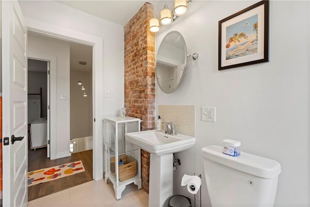 2212 Freeport Rd, Harmar, PA 15238 - bathroom featuring decorative backsplash and tile patterned flooring