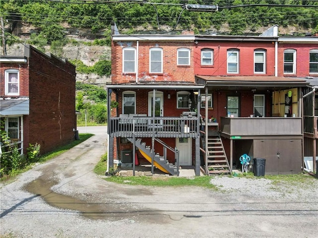 2212 Freeport Rd, Harmar, PA 15238 - view of front of house with stairs, brick siding, and a porch
