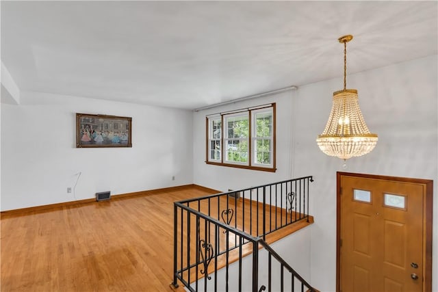 428 Englewood Dr, Ross Twp, PA 15237 - entrance foyer with a chandelier and wood finished floors