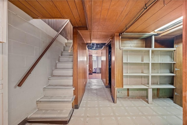 4614 Carroll St, Bloomfield, PA 15224 - below grade area featuring wood ceiling, tile patterned floors, and stairway