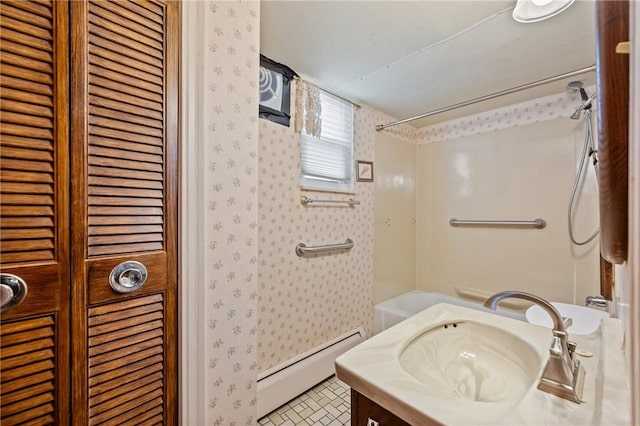 4614 Carroll St, Bloomfield, PA 15224 - full bathroom with wallpapered walls, a baseboard heating unit, vanity, and shower / bathtub combination