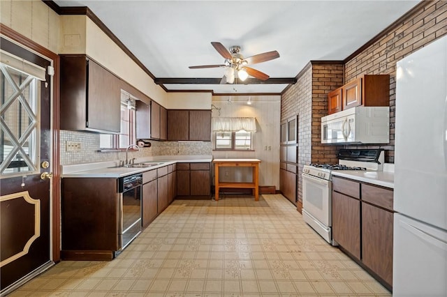 4614 Carroll St, Bloomfield, PA 15224 - kitchen featuring ornamental molding, white appliances, plenty of natural light, light countertops, and ceiling fan