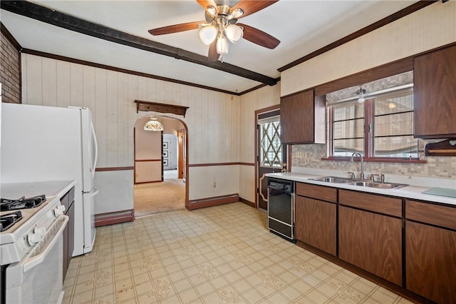 4614 Carroll St, Bloomfield, PA 15224 - kitchen featuring light floors, light countertops, ceiling fan, beam ceiling, and decorative backsplash