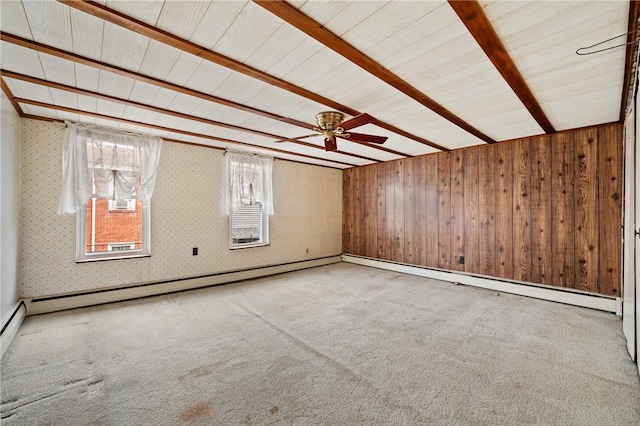 4614 Carroll St, Bloomfield, PA 15224 - empty room with a baseboard heating unit, carpet floors, baseboard heating, and a wooden ceiling with exposed beams