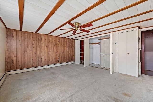 4614 Carroll St, Bloomfield, PA 15224 - unfurnished bedroom with carpet flooring, a baseboard radiator, wooden walls, beamed ceiling, and ceiling fan