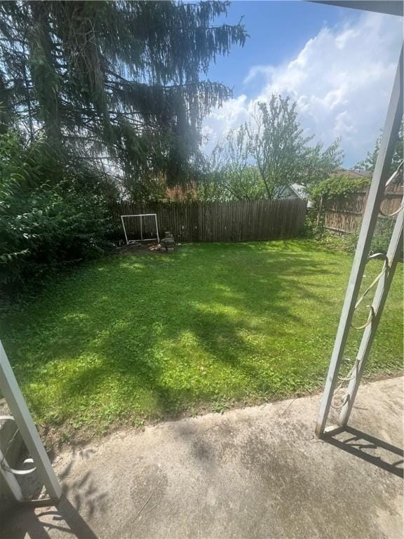 120 Odette St, Overbrook, PA 15227 - fenced backyard featuring a patio