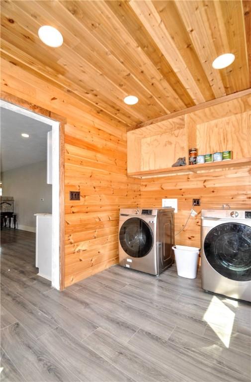 315 Ohio St, Rostraver, PA 15012 - laundry area with washing machine and dryer, wooden ceiling, wooden walls, wood finished floors, and recessed lighting