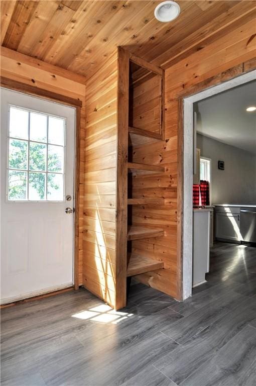 315 Ohio St, Rostraver, PA 15012 - doorway with wooden walls, wooden ceiling, and dark wood-type flooring
