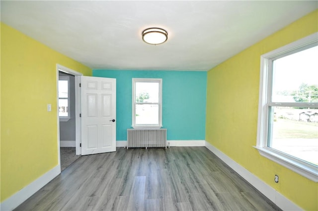 315 Ohio St, Rostraver, PA 15012 - spare room featuring radiator and wood finished floors