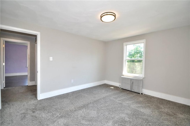 315 Ohio St, Rostraver, PA 15012 - carpeted empty room featuring radiator heating unit and baseboards