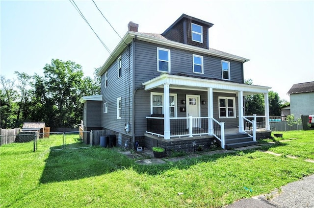 315 Ohio St, Rostraver, PA 15012 - american foursquare style home with a chimney and a porch