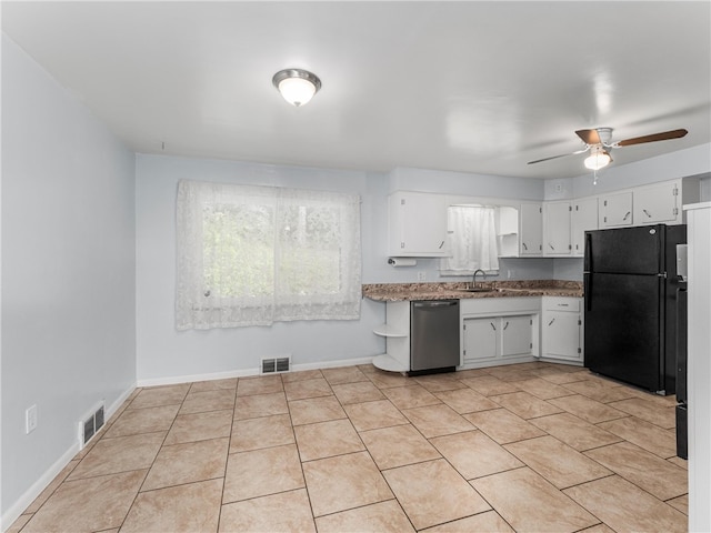 4183 Marion Hill Rd, Daugherty Twp, PA 15066 - kitchen with ceiling fan, freestanding refrigerator, white cabinets, stainless steel dishwasher, and light stone countertops