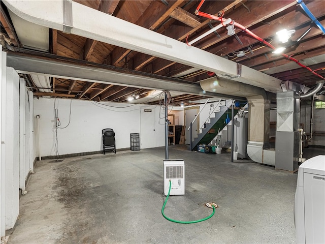 4183 Marion Hill Rd, Daugherty Twp, PA 15066 - unfinished below grade area with stairway, washer / dryer, water heater, and heating unit