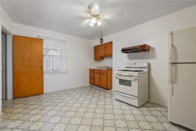 1113 Mary Ann St, South Side, PA 15203 - kitchen with white appliances, brown cabinets, ceiling fan, ventilation hood, and light countertops