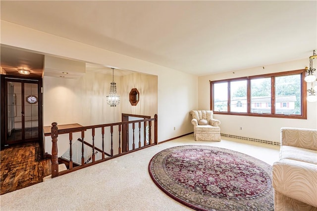 4045 Blue Willow, Hempfield Twp, PA 15642 - sitting room featuring carpet floors, an upstairs landing, a baseboard radiator, and a chandelier