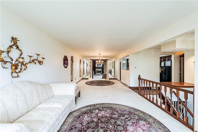 4045 Blue Willow, Hempfield Twp, PA 15642 - living area featuring a chandelier and light colored carpet