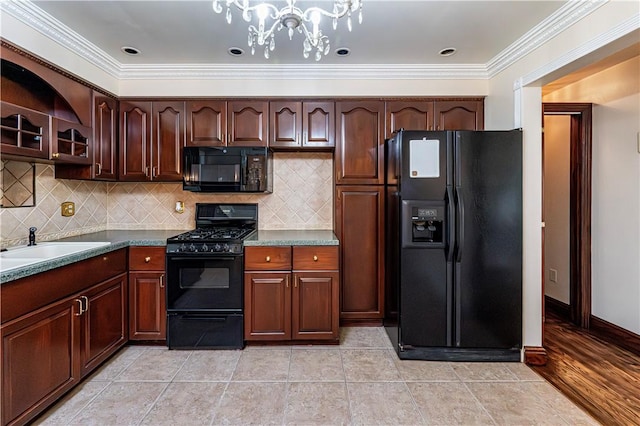 4045 Blue Willow, Hempfield Twp, PA 15642 - kitchen featuring black appliances, ornamental molding, a chandelier, decorative backsplash, and glass insert cabinets