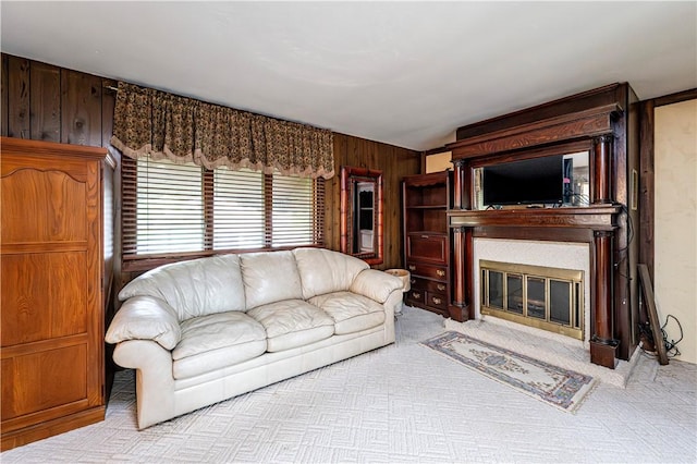 4045 Blue Willow, Hempfield Twp, PA 15642 - carpeted living room with wooden walls and a fireplace with flush hearth