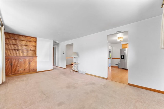 1926 Worcester Dr, Pittsburgh, PA 15243 - unfurnished living room with light carpet and baseboards