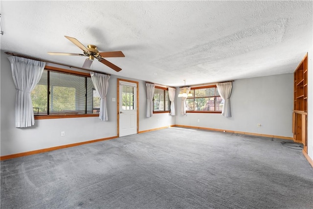1926 Worcester Dr, Pittsburgh, PA 15243 - empty room with a ceiling fan, a textured ceiling, carpet, and plenty of natural light