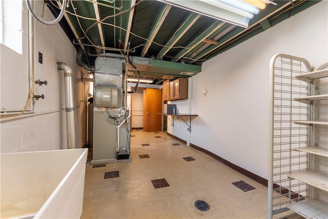 1926 Worcester Dr, Pittsburgh, PA 15243 - unfinished basement featuring light flooring, heating unit, and concrete block wall