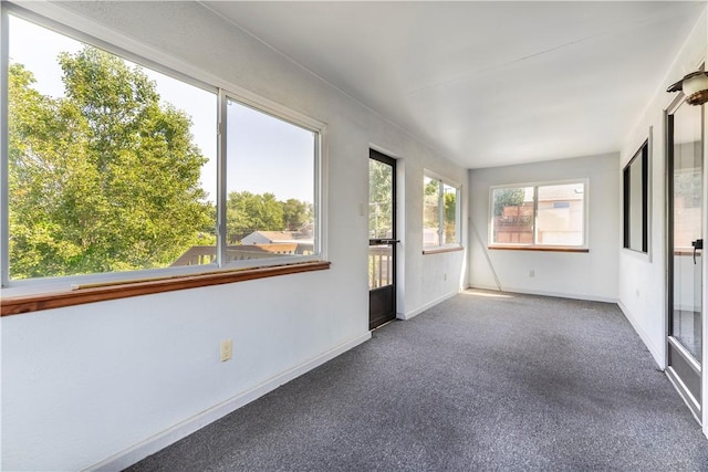 1926 Worcester Dr, Pittsburgh, PA 15243 - unfurnished sunroom featuring baseboards and carpet floors