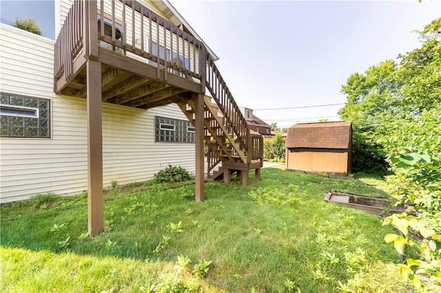 1926 Worcester Dr, Pittsburgh, PA 15243 - view of green lawn with a storage unit, stairs, and a deck