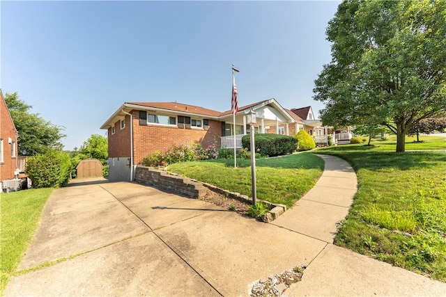 1926 Worcester Dr, Pittsburgh, PA 15243 - view of front of property with brick siding, a front yard, and driveway