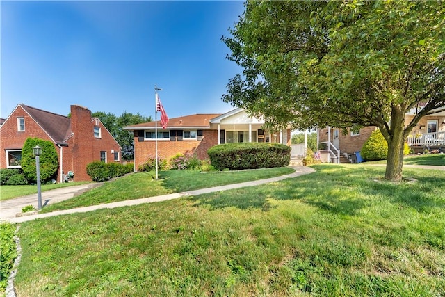 1926 Worcester Dr, Pittsburgh, PA 15243 - view of front of property with brick siding and a front lawn