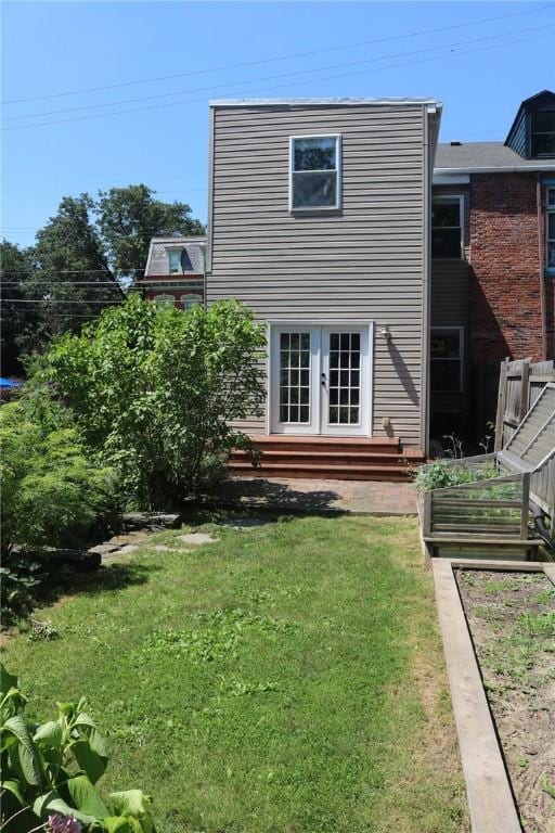 611 Jacksonia St, Central North Side, PA 15212 - rear view of house featuring french doors and a yard