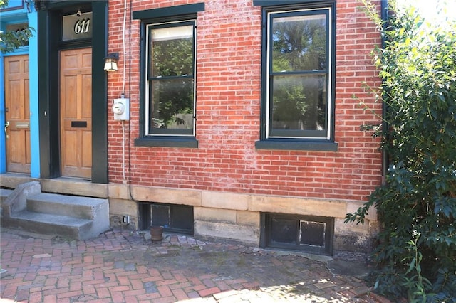 611 Jacksonia St, Central North Side, PA 15212 - doorway to property with brick siding