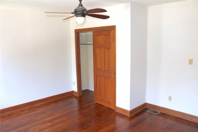 611 Jacksonia St, Central North Side, PA 15212 - unfurnished bedroom with dark wood-type flooring, a ceiling fan, and a closet