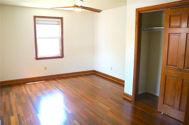 611 Jacksonia St, Central North Side, PA 15212 - unfurnished bedroom featuring dark wood-style flooring, a closet, and a ceiling fan