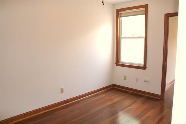 611 Jacksonia St, Central North Side, PA 15212 - spare room featuring baseboards and dark wood-style flooring