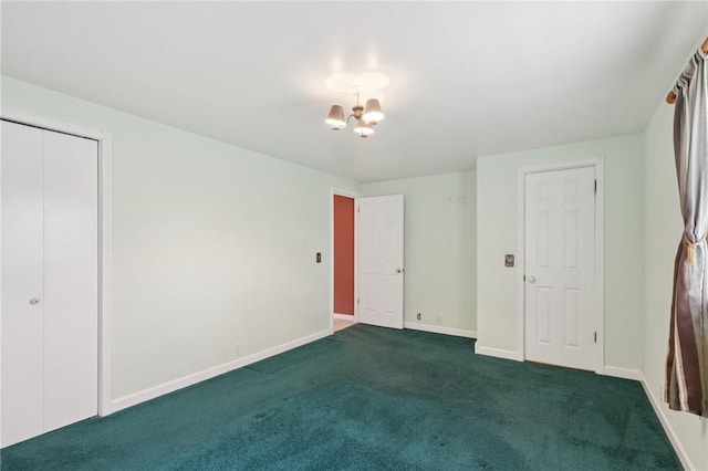 714 Colonial, Washington Twp, PA 15613 - unfurnished bedroom with carpet and a chandelier
