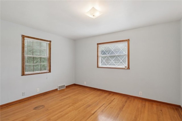 714 Colonial, Washington Twp, PA 15613 - spare room featuring healthy amount of natural light and light wood-style floors