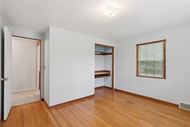 714 Colonial, Washington Twp, PA 15613 - unfurnished bedroom featuring light wood-type flooring and a closet