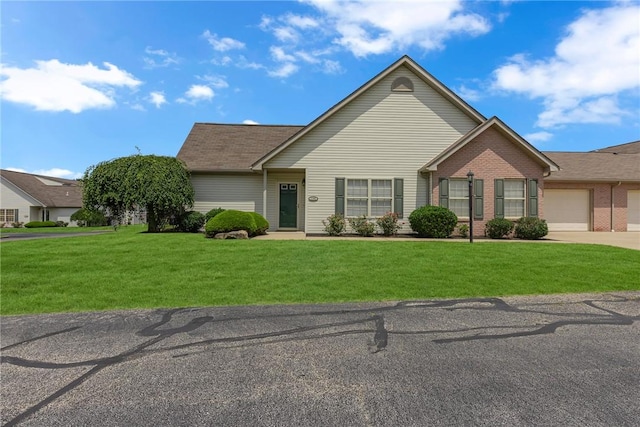 1101 Timberwood, Chippewa Twp, PA 15010 - view of front facade with a front yard, an attached garage, concrete driveway, brick siding, and a shingled roof