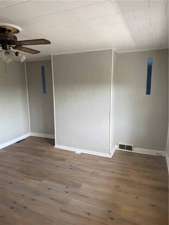 965 Leeds, Monessen, PA 15062 - empty room featuring ceiling fan and wood finished floors