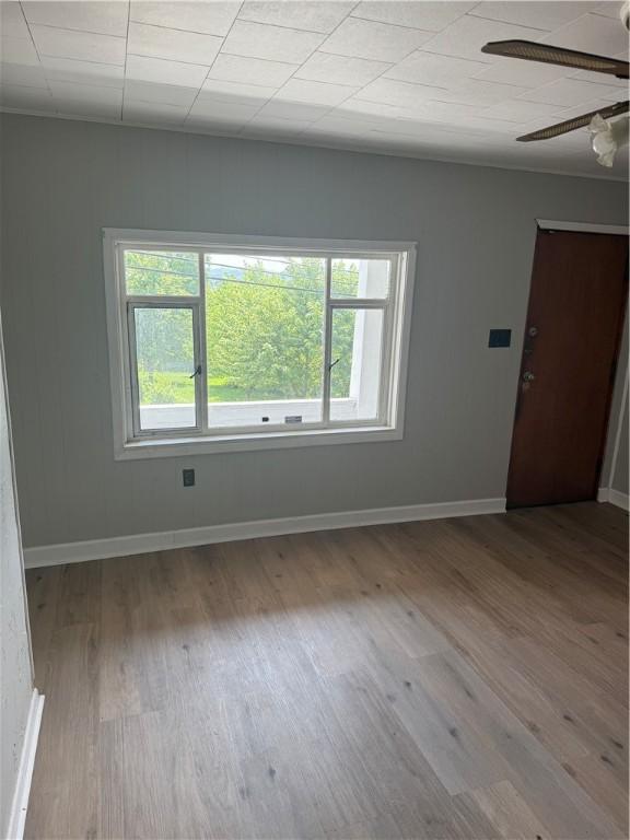 965 Leeds, Monessen, PA 15062 - empty room featuring wood finished floors and a ceiling fan