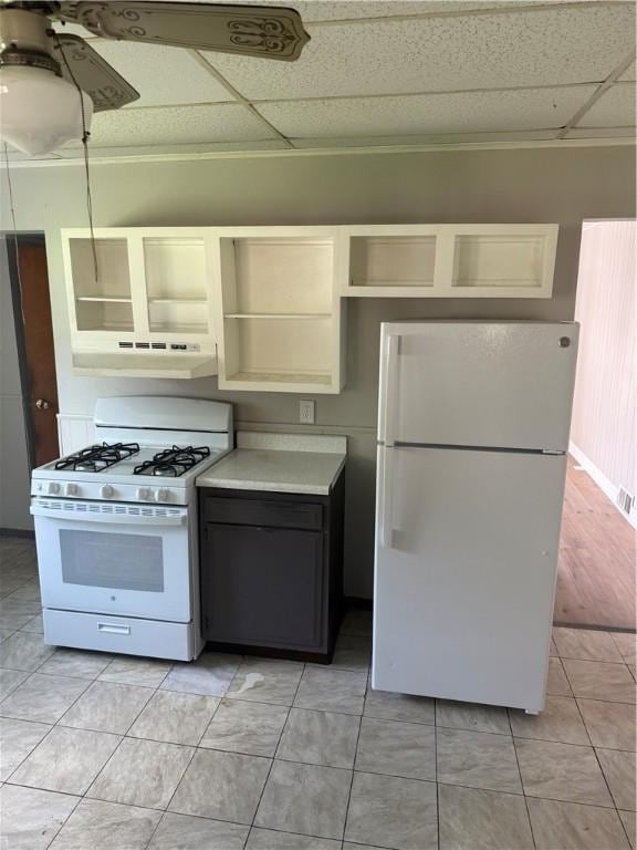 965 Leeds, Monessen, PA 15062 - kitchen featuring white appliances, a paneled ceiling, under cabinet range hood, a ceiling fan, and light countertops